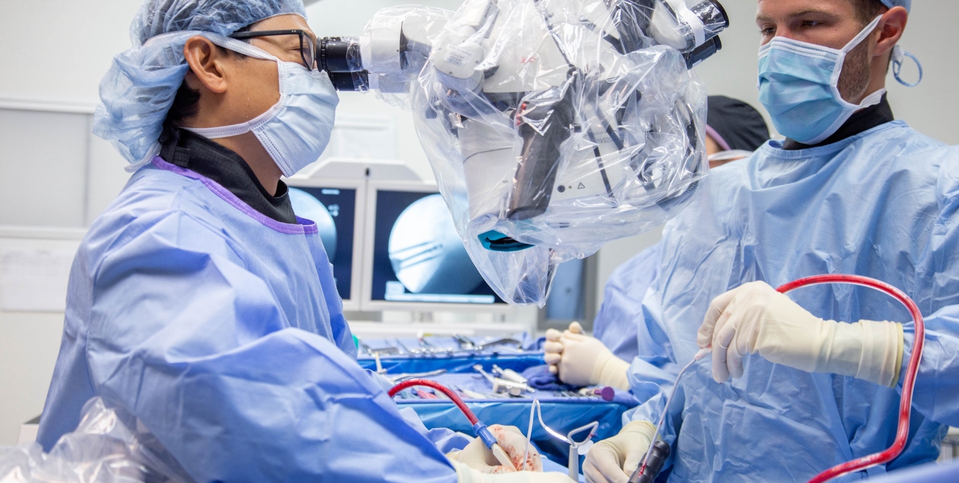 Dr. Young performing minimally invasive spine surgery
