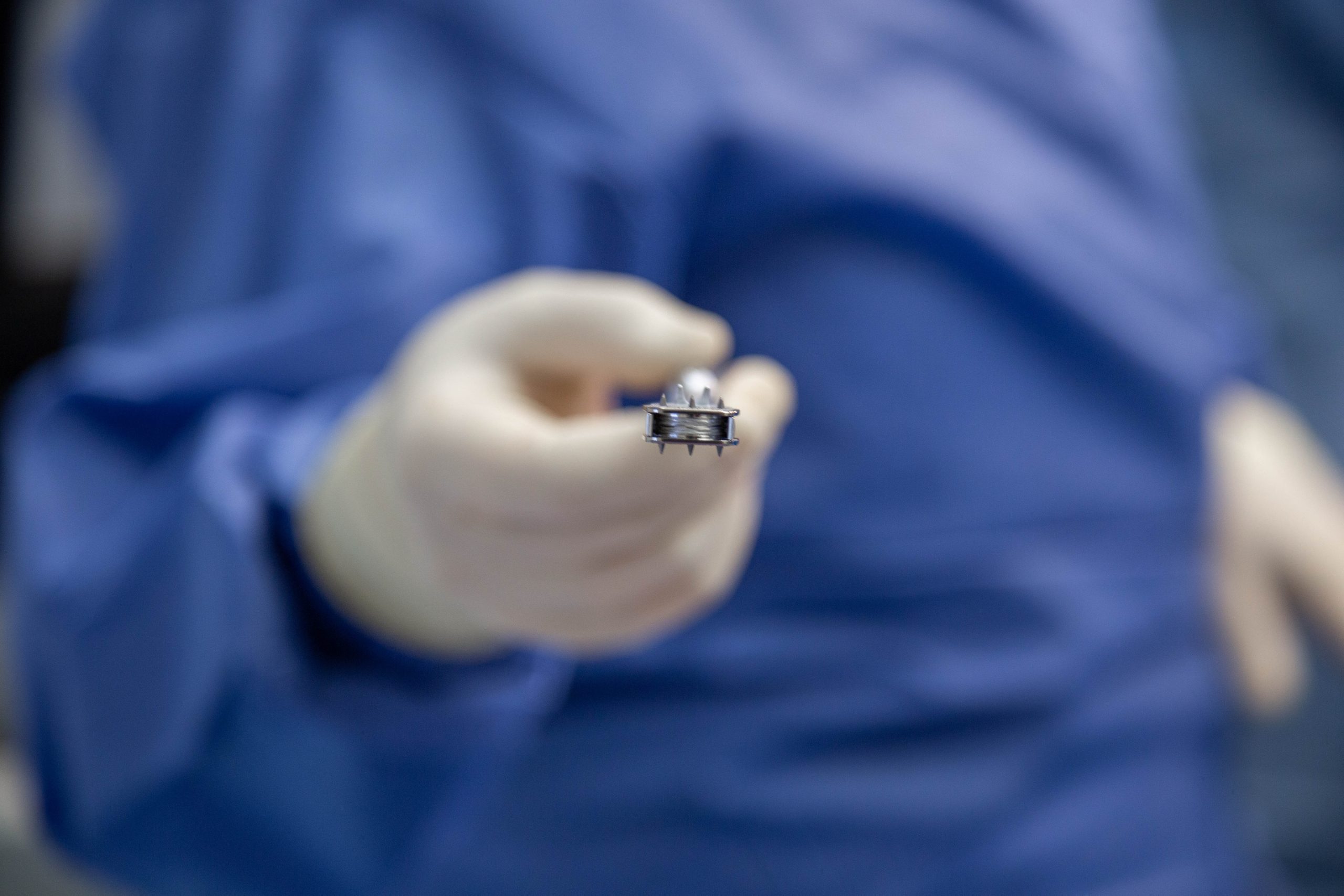 Doctor Holding Surgical Tool