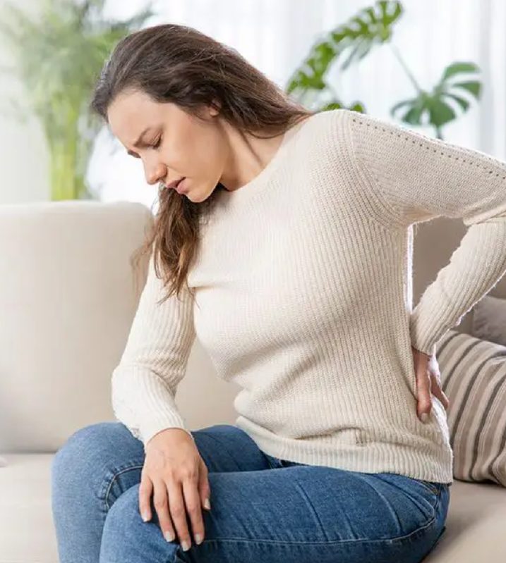 Woman with facet joint pain