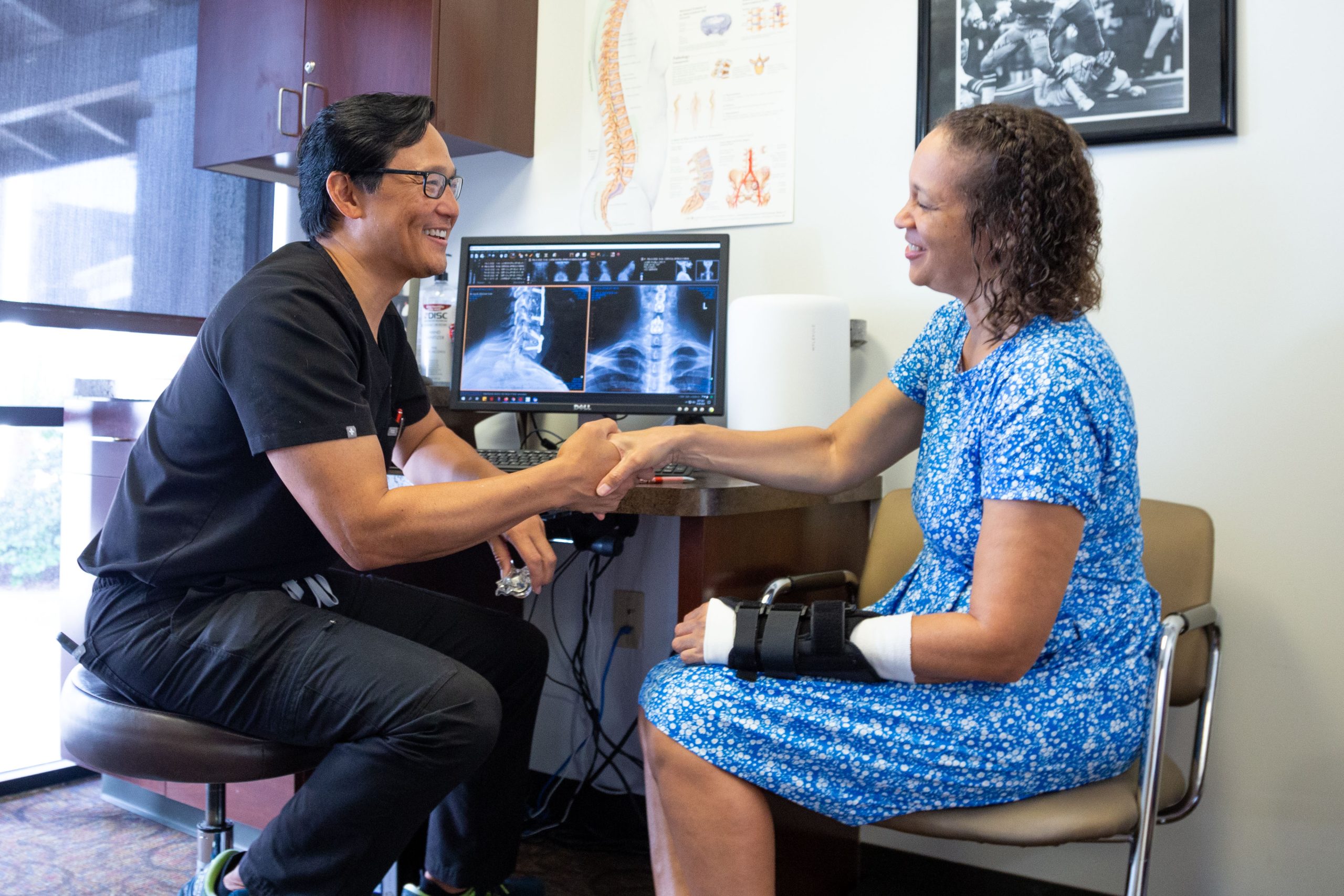 Dr Yeung shaken female patient hand