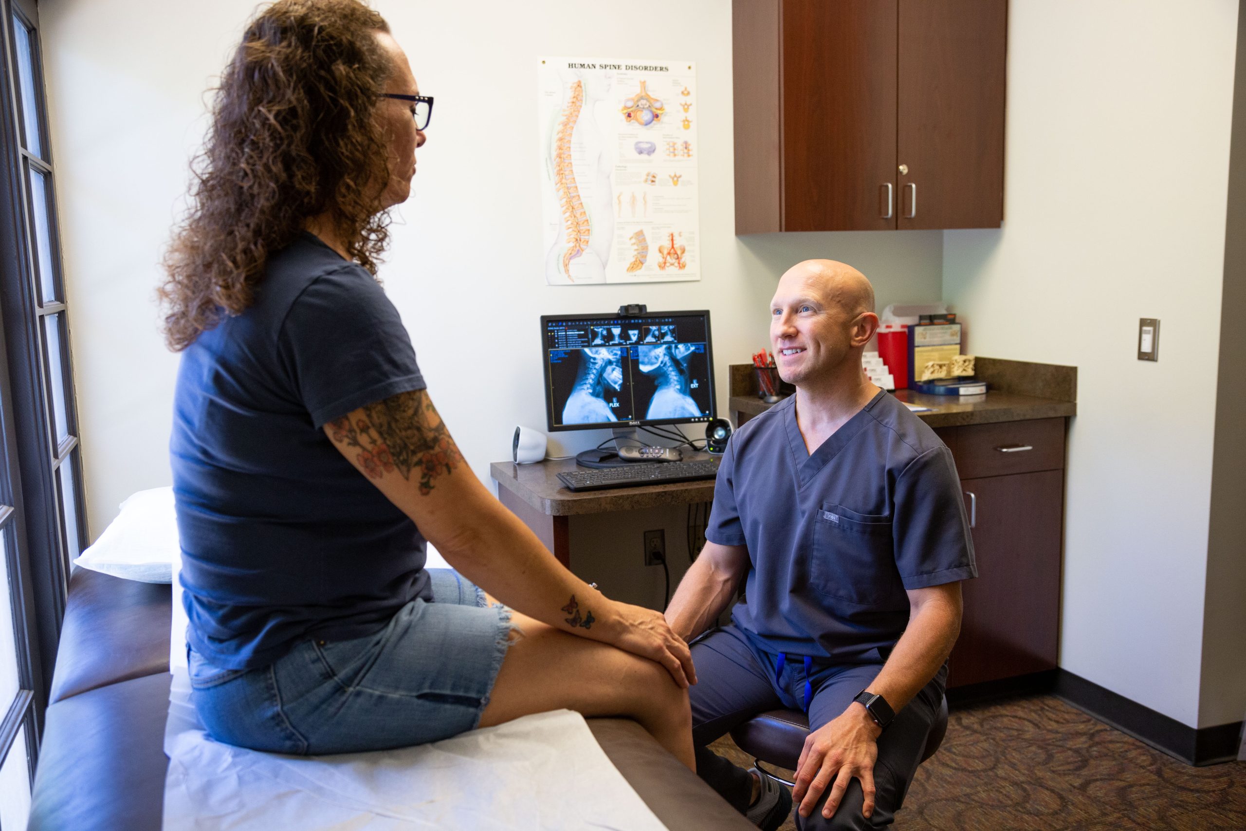 Dr. Fields talking to a female patient