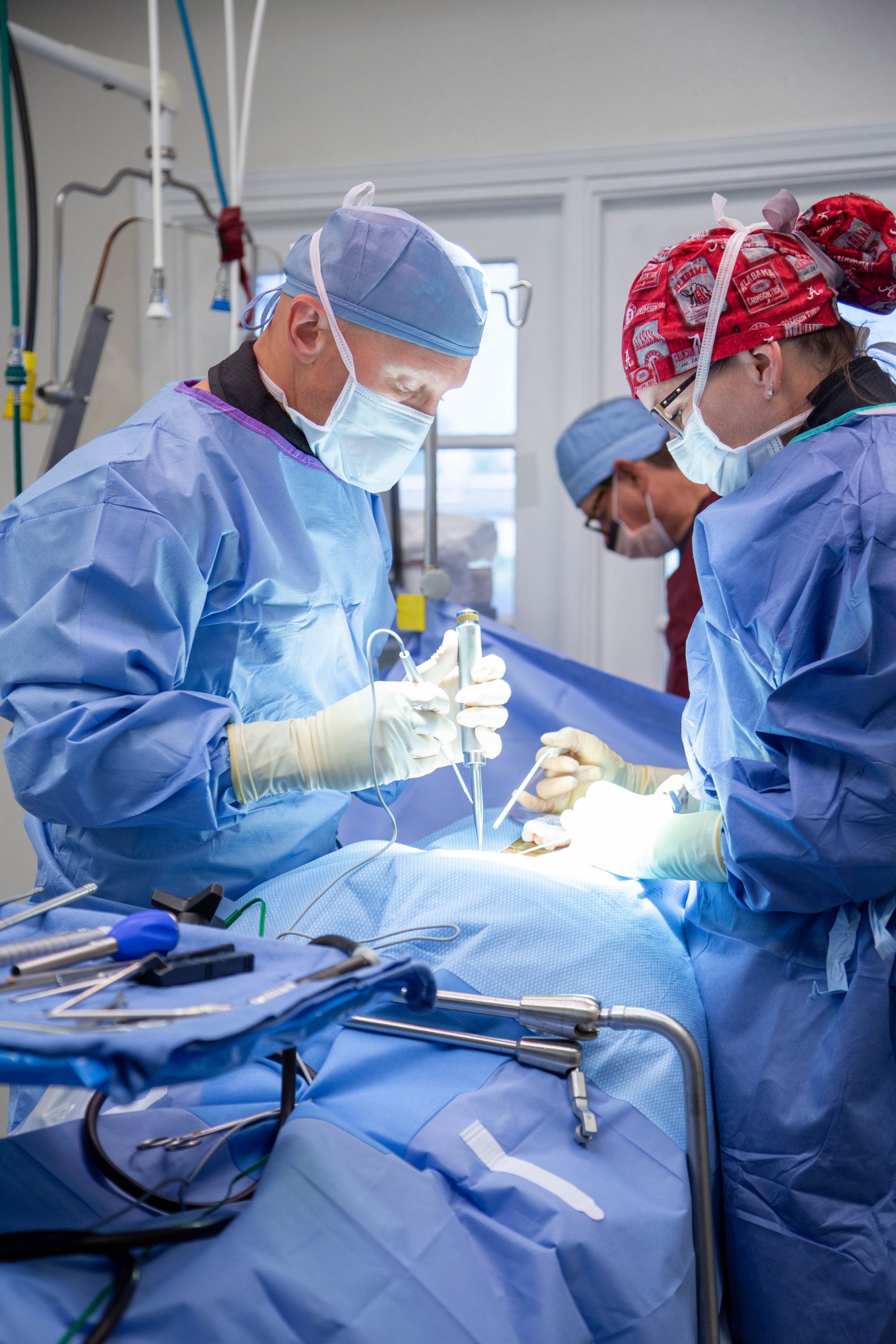 surgeons performing surgery